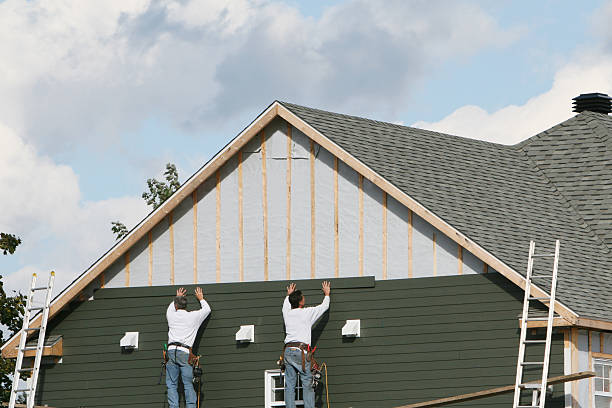 Professional Siding Contractor technician working in Centreville, VA